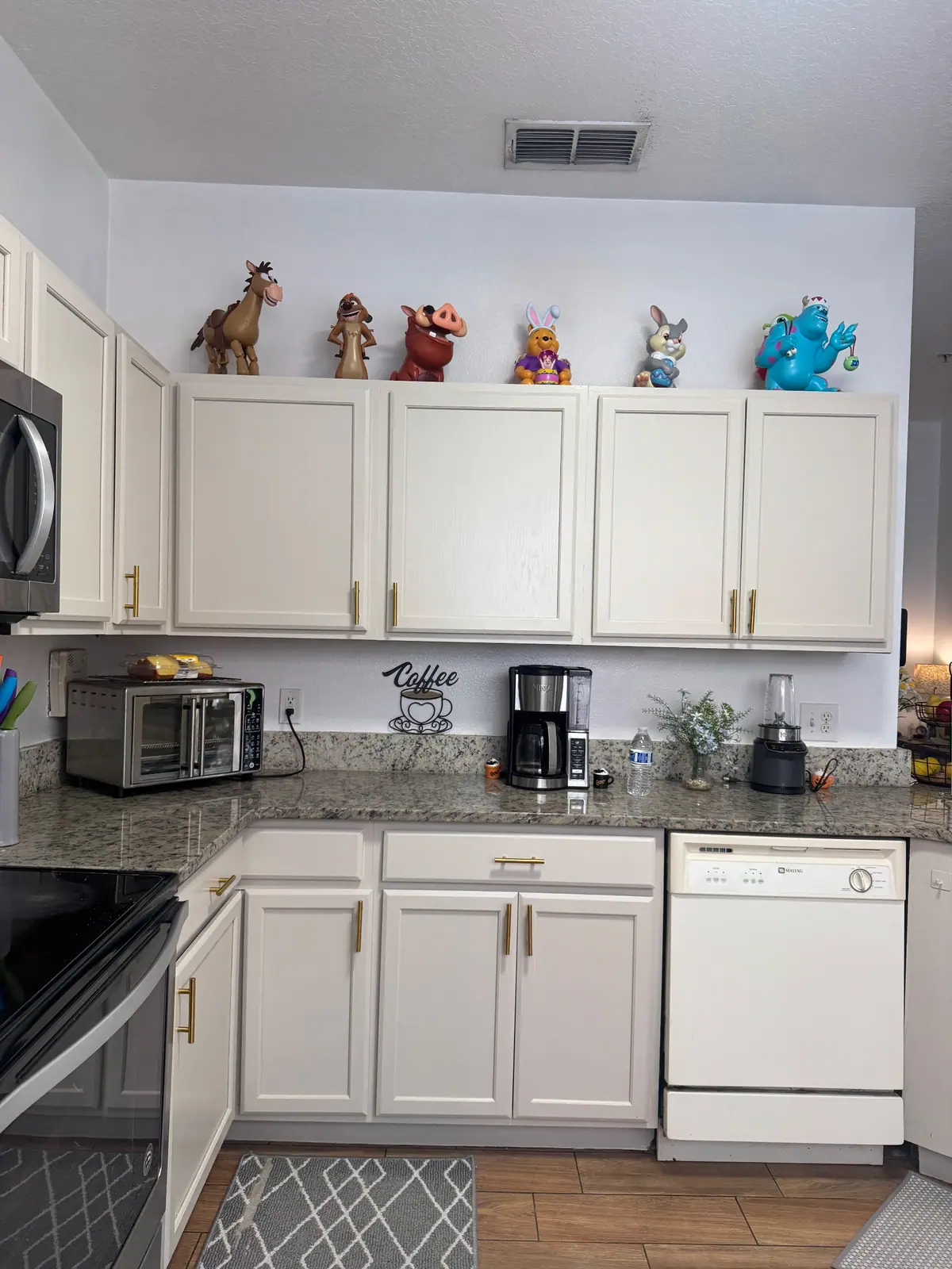 Cream cabinets around the coffee corner